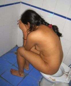 shy desi housewife cover face when caught nude pissing