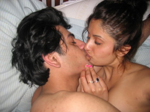 Horny young Indian lovers kissing and chewing lips