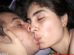 indian new wed couple Kissing Photo in bedroom
