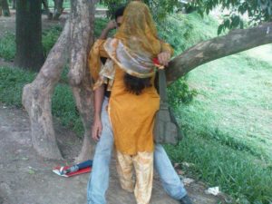 desi indian village couple kissing photo
