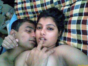 Desi Couple horny in bed pic