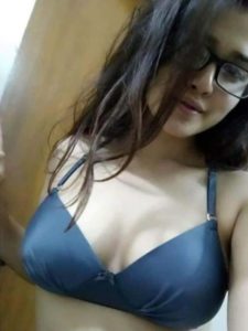 college girl wearing specs showing her boobies